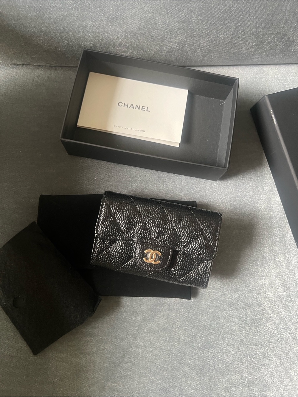 CHANEL Black Quilted Caviar Leather Wallet with Gold CC